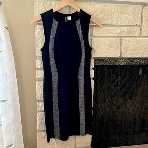 Black sleeveless bodycon dress with beautiful gray detail to emphasize curves!